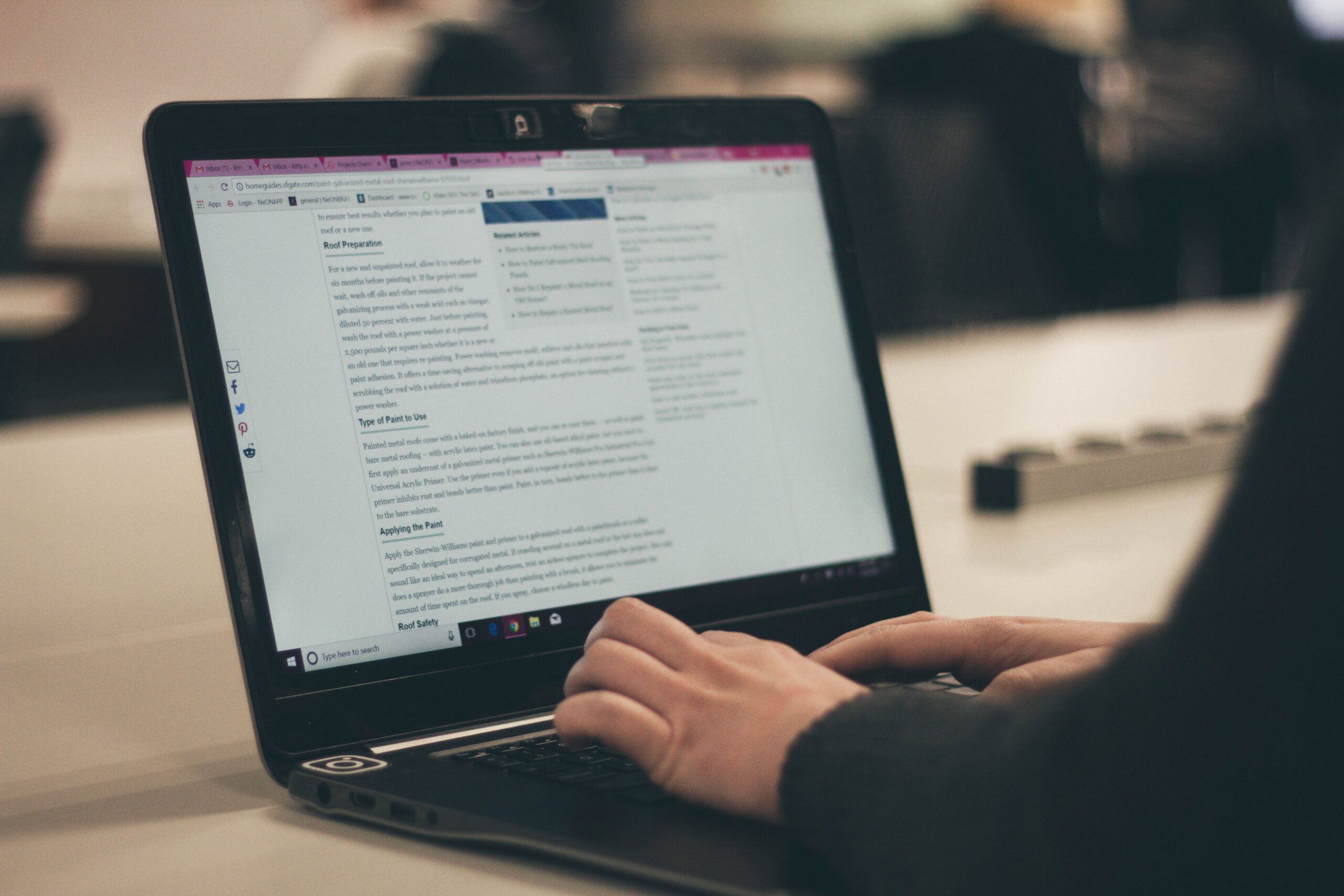 10 Ways to Make Your Press Release Go Further 2 A person at the computer, writing a newsletter to help their press release go further